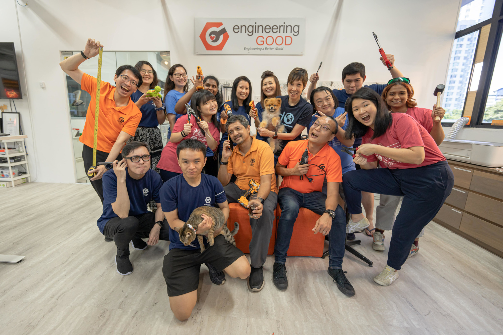 Team photo at Engineering Good, a tech and engineering charity in Singapore that empowers vulnerable and low-income communities.